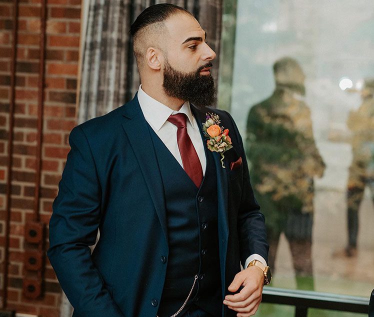 Portrait of the Groom on a Wedding Day Walk